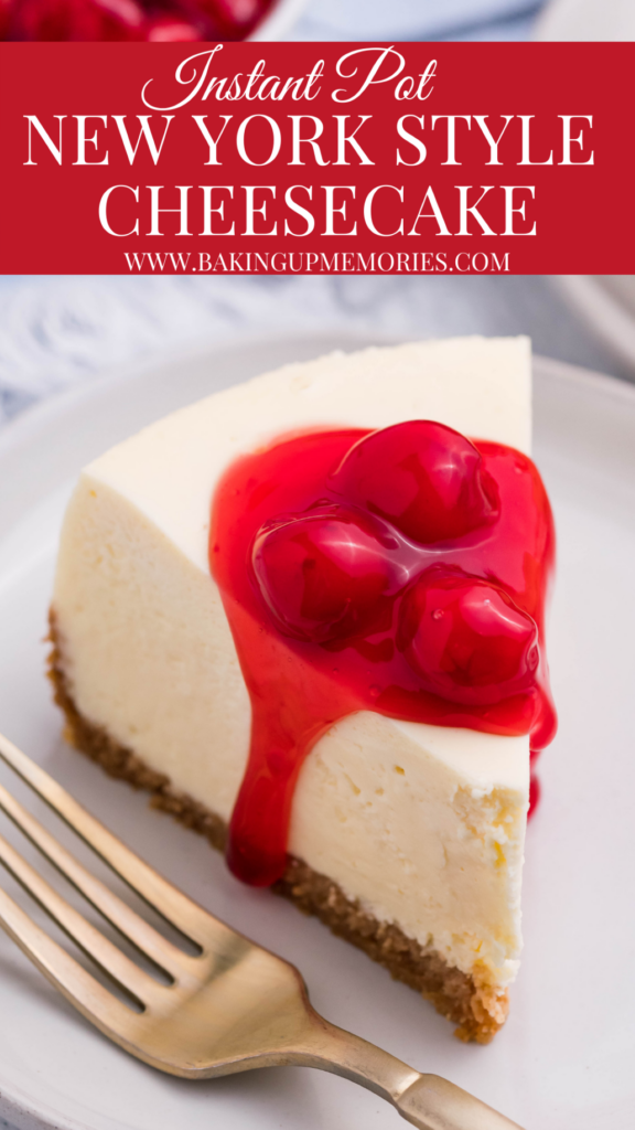 A slice of Instant Pot New York Style Cheesecake on a white plate topped with cherry topping and a gold fork. 