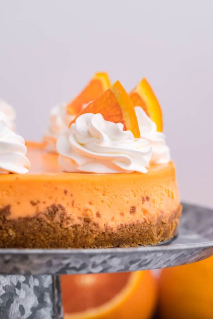 A side view showing the layers of the orange creamsicle cheesecake