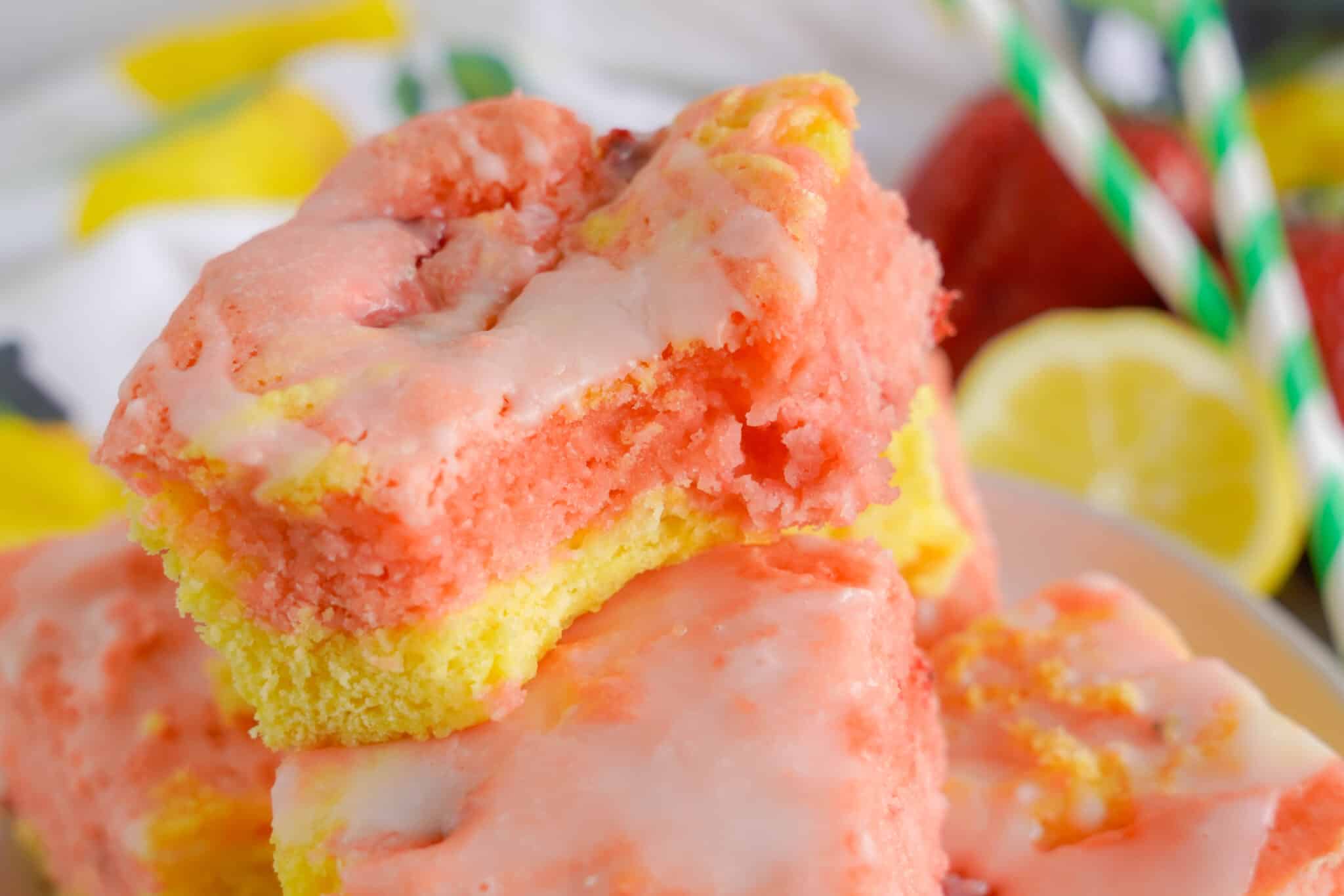 stack of three strawberry Lemon Blondies with a a bite taken out